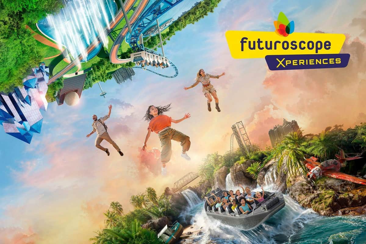 Three people float mid-air near a rollercoaster with inversed scenery; a boat ride with passengers is below.