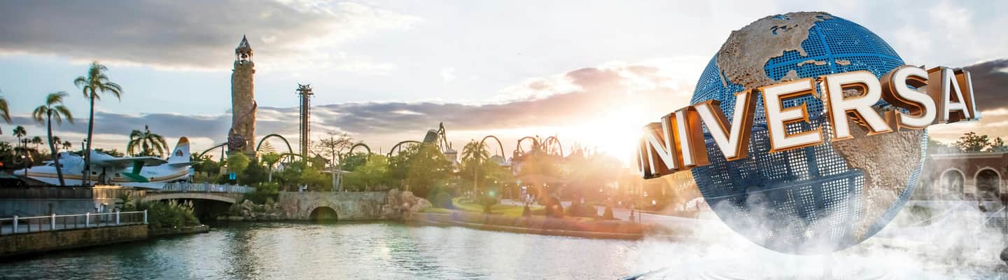 A theme park scene with a globe sculpture, water, roller coaster tracks, a seaplane, and a sunset in the background.